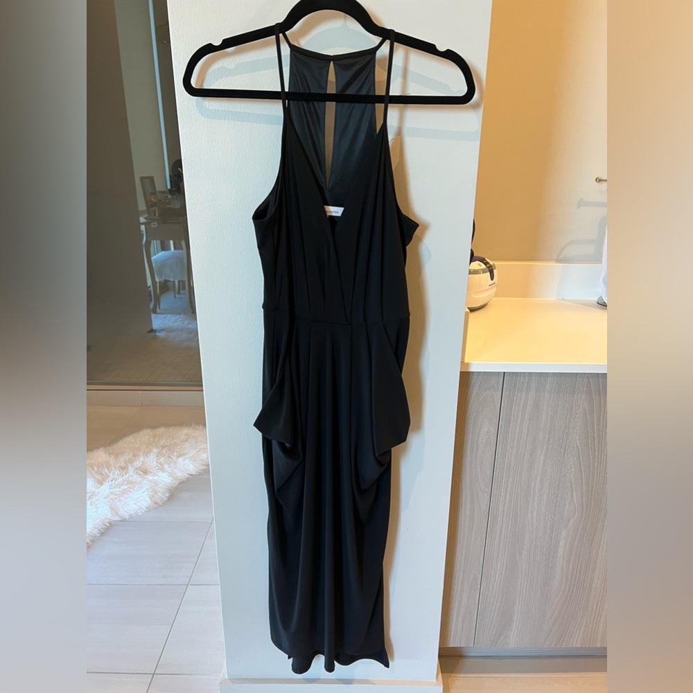 BCBGeneration. Black drapery long open back  dress. Size small.